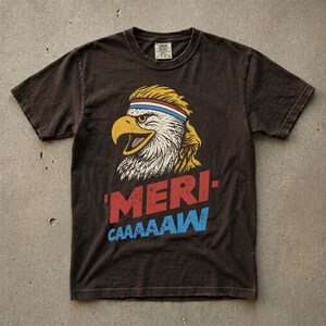 Distressed retro graphic featuring a bald eagle with a squawking open yellow beak and a blonde mullet haircut. The eagle wears a red, white, and blue striped athletic sweatband. Below the illustration, large weathered block text reads "'MERI-" in red, stacked above "CAAAAAW" in bright blue.