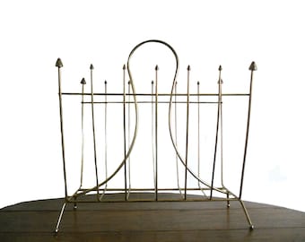 Vintage Mid Century Magazine Rack 1960s Atomic Style Brass Rack con diseño de punta de flecha
