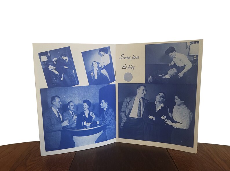 May include: A black and white photo booklet with scenes from a play. The booklet has a white background with blue text that reads "Scenes from the play". The photos show actors in various scenes from the play.