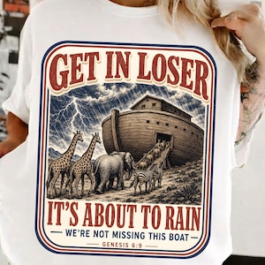 May include: White t-shirt with a graphic featuring the text "GET IN LOSER" above an illustration of Noah's Ark, animals, and the text "IT'S ABOUT TO RAIN". The design includes giraffes, an elephant, and zebras. The text "GENESIS 6:9" is also included.