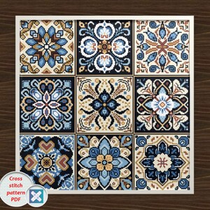 Puede incluir: Un patrón de punto de cruz enmarcado con nueve paneles cuadrados. Cada panel muestra un diseño floral detallado en azul, beige y blanco sobre un fondo negro. El texto "Cross stitch pattern PDF" es visible en la esquina inferior izquierda.