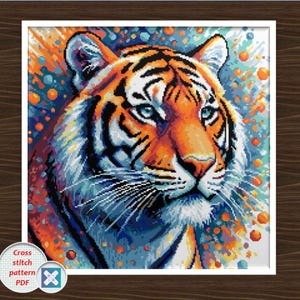 May include: A white ceramic mug with a black handle and the text "But First, Coffee" in a bold, black font. The mug is set against a blurred background, suggesting a cozy setting.