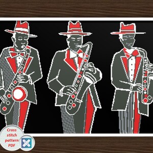 May include: A cross stitch pattern PDF featuring three musicians in fedoras and suits playing saxophones. The design uses a color palette of black, white, and red, depicting the figures in a stylized, pixelated format against a solid black background.