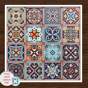 May include: A square cross-stitch pattern featuring sixteen square tiles with intricate geometric designs. The tiles showcase a palette of blue, orange, and brown, creating a mosaic-like effect. The text "Cross stitch pattern PDF" is visible.