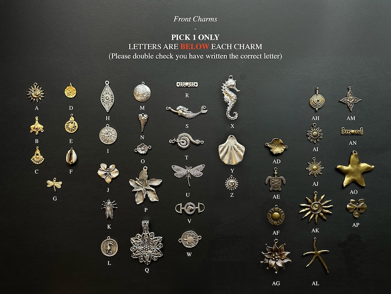 May include: A collection of assorted metal charms in gold and silver tones, arranged in a grid with identifying letters. The text reads: Front Charms, PICK 1 ONLY, LETTERS ARE BELOW EACH CHARM, (Please double check you have written the correct letter).