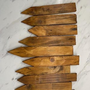 Re-claimed wooden plant labels.