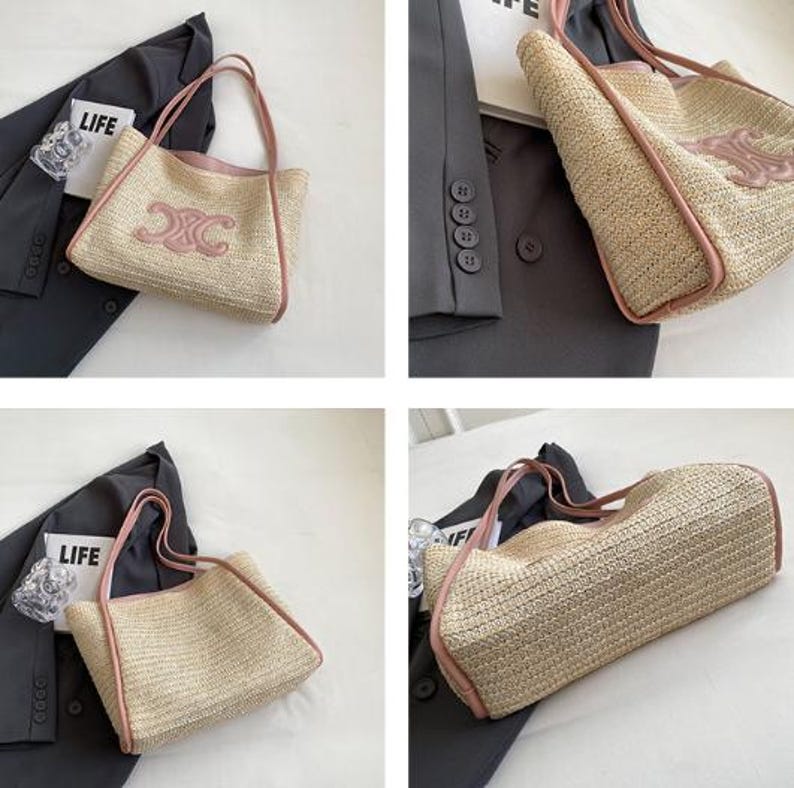 May include: A woven straw tote bag with pink trim and handles. The bag features a pink logo on the front. The bag is shown with a dark gray blazer and a clear glass with the word "LIFE" printed on it.