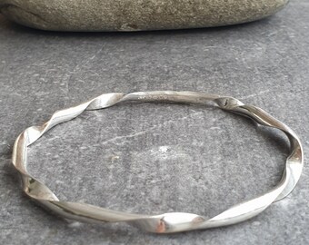 Silver twist bangle, Spiral bracelet, Solid silver stacker, Sterling ribbon bangle, Modern ladies bangle Silver twist bangle, Spiral bracelet, Solid silver stacker, Sterling ribbon bangle, Modern ladies bangle