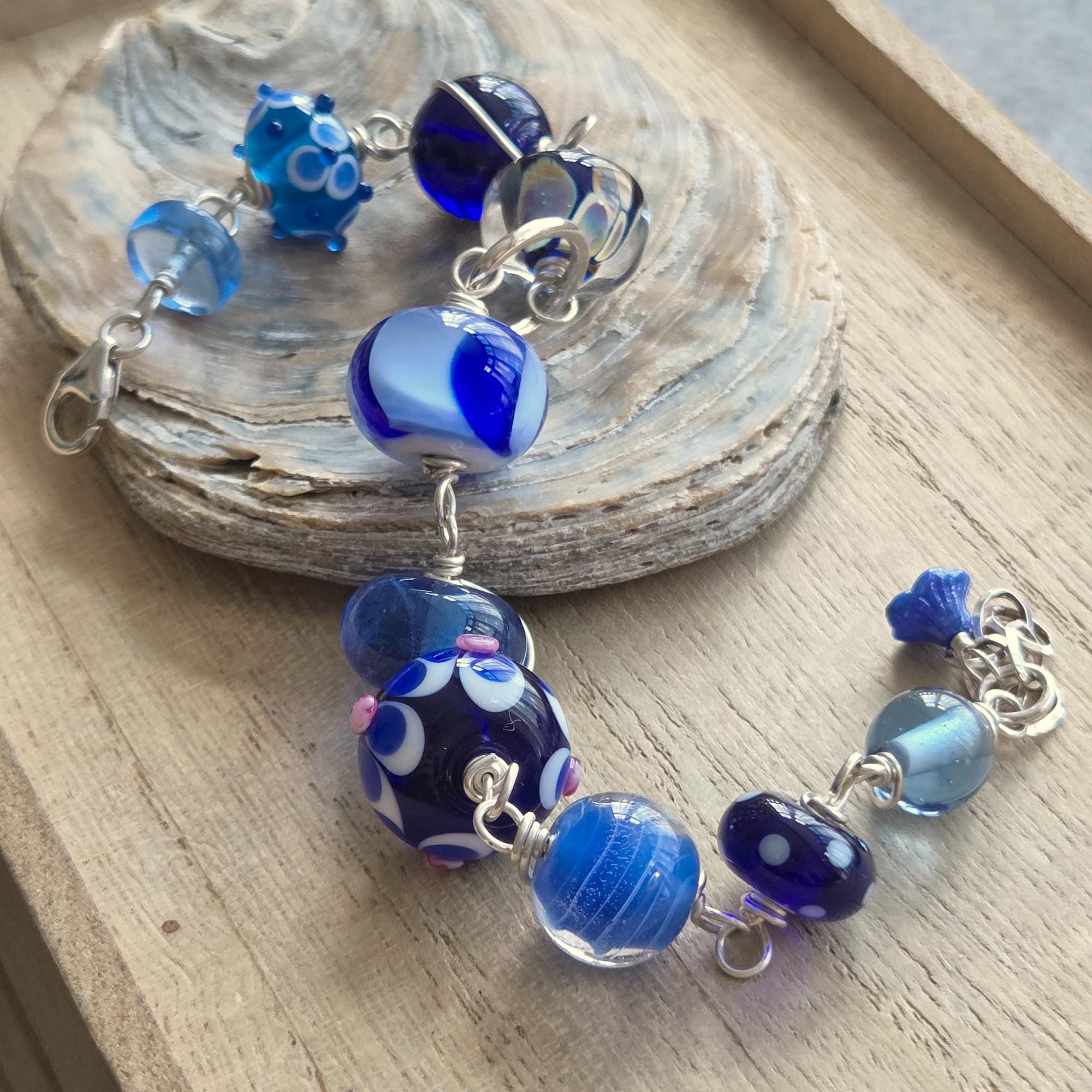 Turquoise blue earrings lampwork beads - Etsy 日本