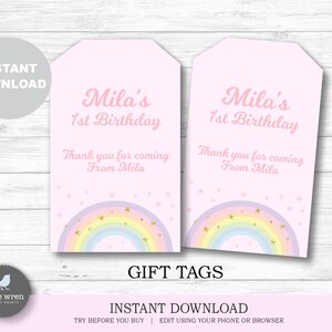 May include: Two pink gift tags with a rainbow and stars design. The text on the tags reads "Mila's 1st Birthday" and "Thank you for coming From Mila".