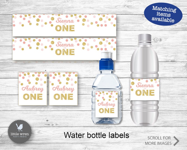 May include: Water bottle labels with a pink and gold confetti design. The labels feature the text "Sienna is One" and "Aubrey is One".