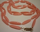 Vintage 1970s pink beaded necklace with metal clasp