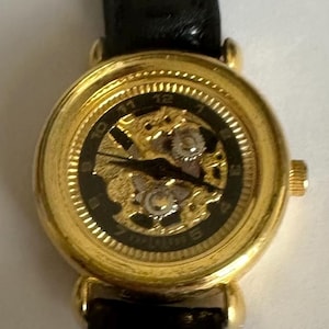 Vintage Gold Tone Skeleton Watch, Black Leather Strap, 80s-90s Analog Wristwatch
