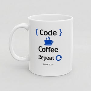 Alternate-side view of a white ceramic mug showing the “Code Coffee Repeat” design and “Since 2015” personalization, with the handle on the opposite side to show double-sided printing.