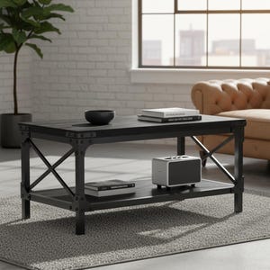 May include: A black rectangular coffee table with a lower shelf, featuring a metal frame and visible rivets. The table holds a black bowl, books, and a small speaker. The design is industrial, with a dark finish, and sits on a gray rug.
