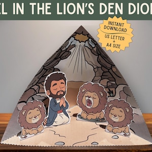 May include: A paper diorama depicting the biblical story of Daniel in the lion's den. The scene includes a praying figure and three lions. The diorama is triangular with a cave-like background and the text "DANIEL IN THE LION'S DEN DIORAMA".