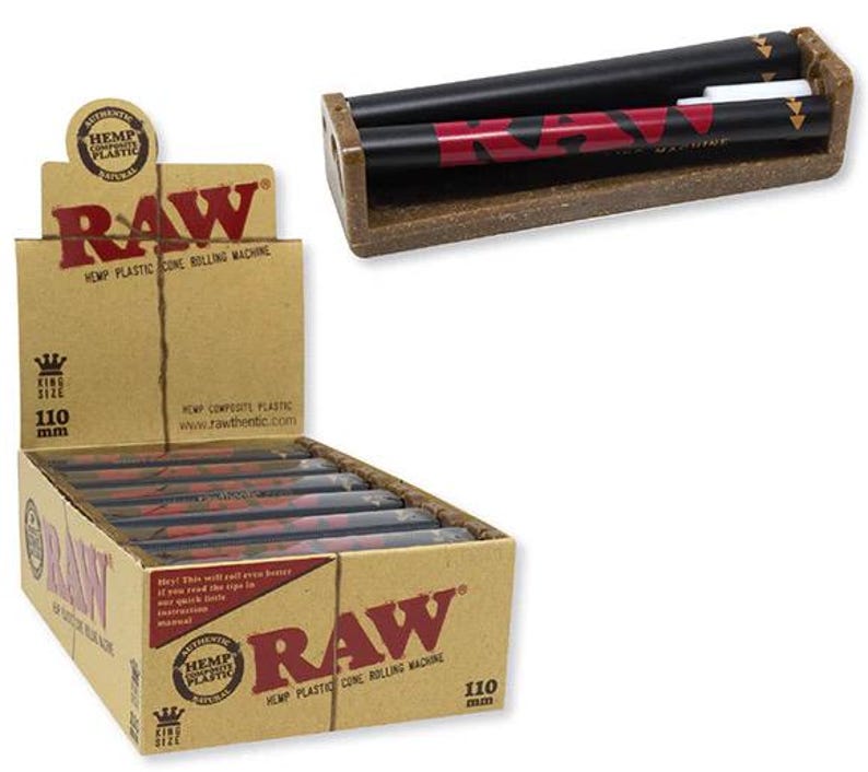 May include: A RAW brand hemp composite plastic cone rolling machine for 110 mm king size cones. The product is displayed in a tan cardboard retail box with red RAW branding, and a single black rolling machine is shown positioned above the box.