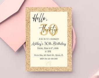May include: A birthday invitation with a gold glitter border and a cream-coloured centre. The text reads "Hello, thirty" in black and gold script, inviting guests to Ashley's 30th birthday on March 6th, 2026, at 7 PM.