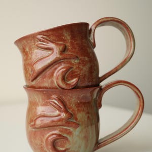 handmade ceramic bunny jumping over the moon woody space mug no preference