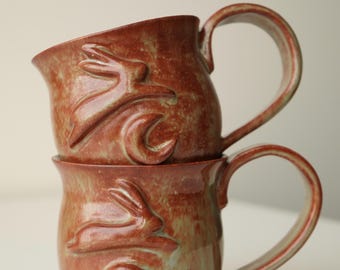 handmade ceramic bunny jumping over the moon woody space mug