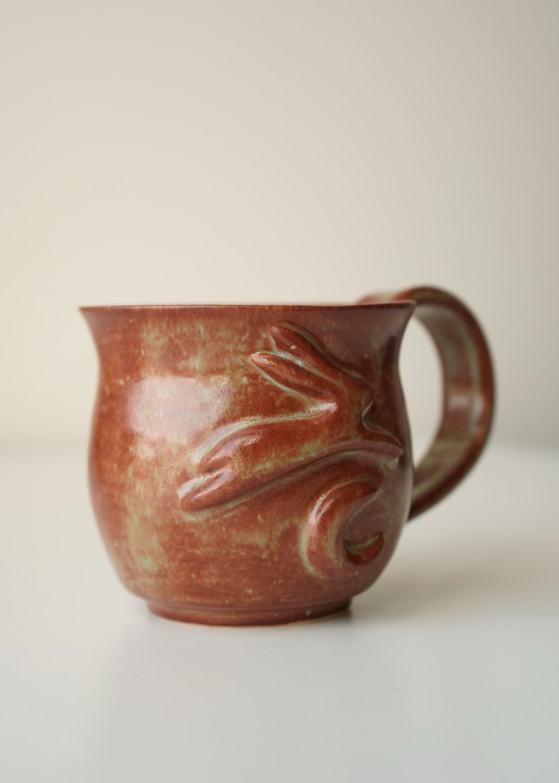 handmade ceramic bunny jumping over the moon woody space mug mug #2 (top mug)