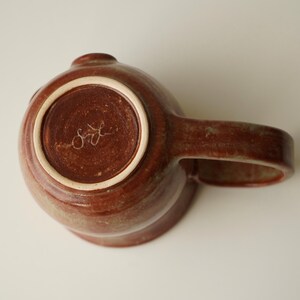 handmade ceramic bunny jumping over the moon woody space mug image 10