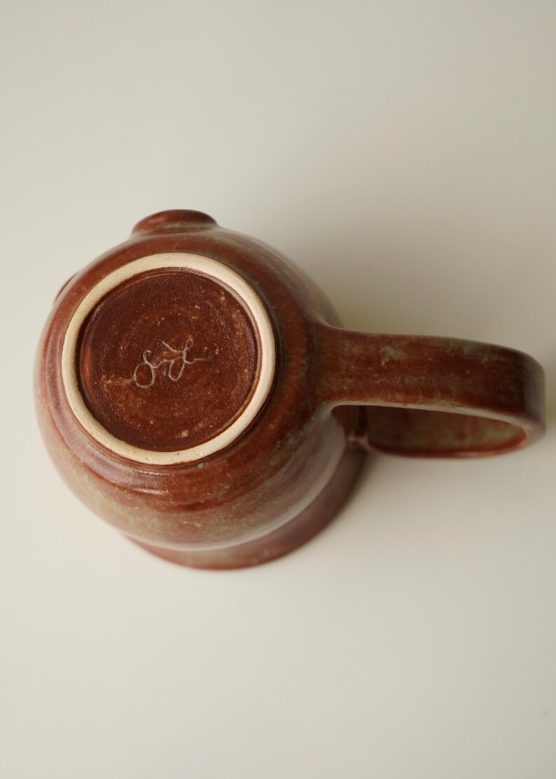 handmade ceramic bunny jumping over the moon woody space mug image 10