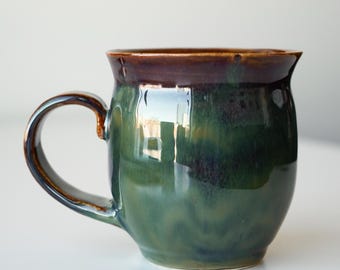 handmade ceramic whimsical blue green space galaxy fairy mug