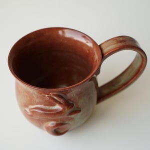 handmade ceramic bunny jumping over the moon woody space mug image 5