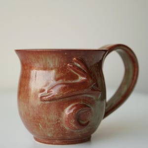 handmade ceramic bunny jumping over the moon woody space mug mug #1 (bottom mug)