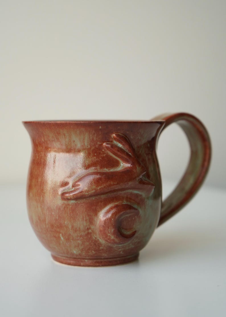 handmade ceramic bunny jumping over the moon woody space mug mug #1 (bottom mug)
