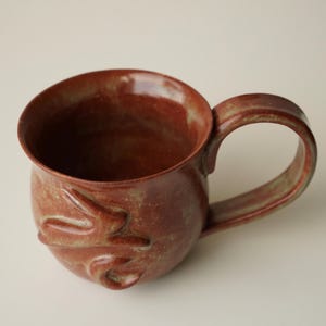 handmade ceramic bunny jumping over the moon woody space mug image 9