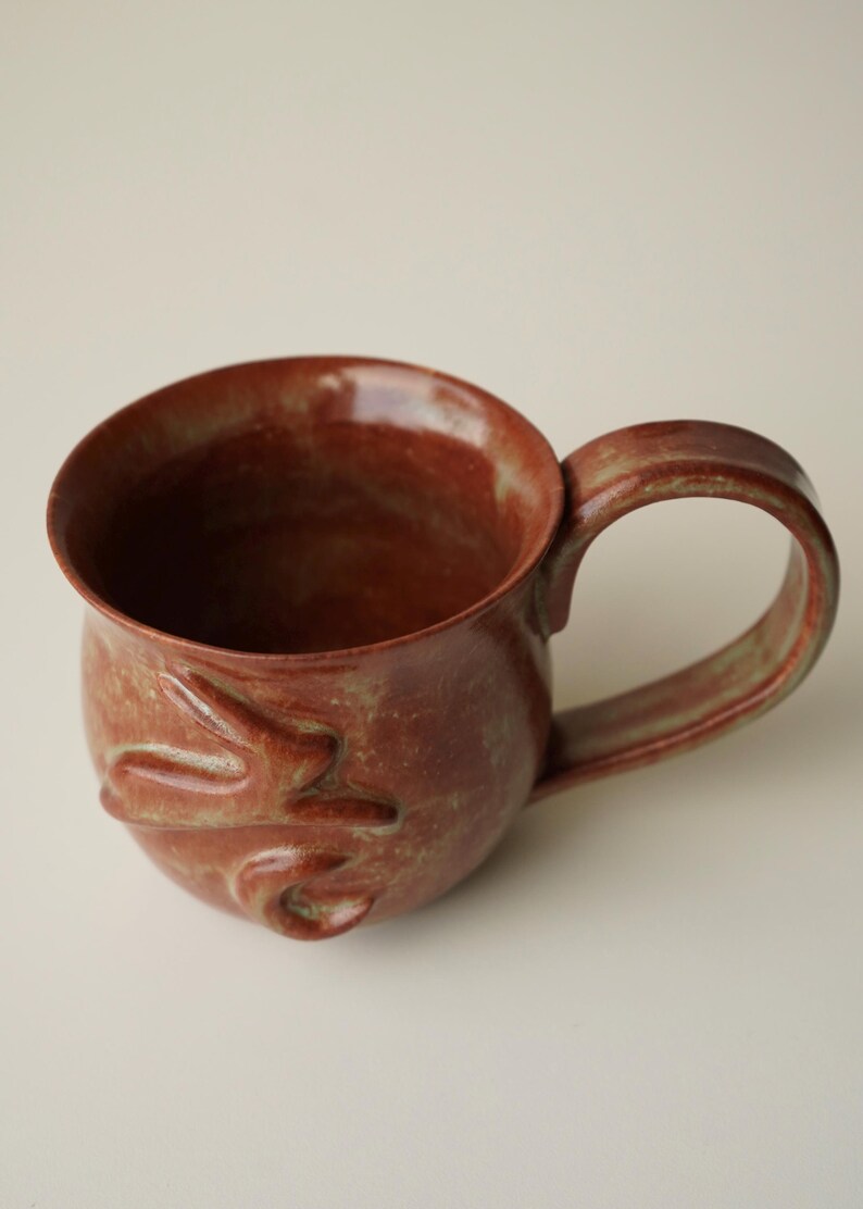 handmade ceramic bunny jumping over the moon woody space mug image 9