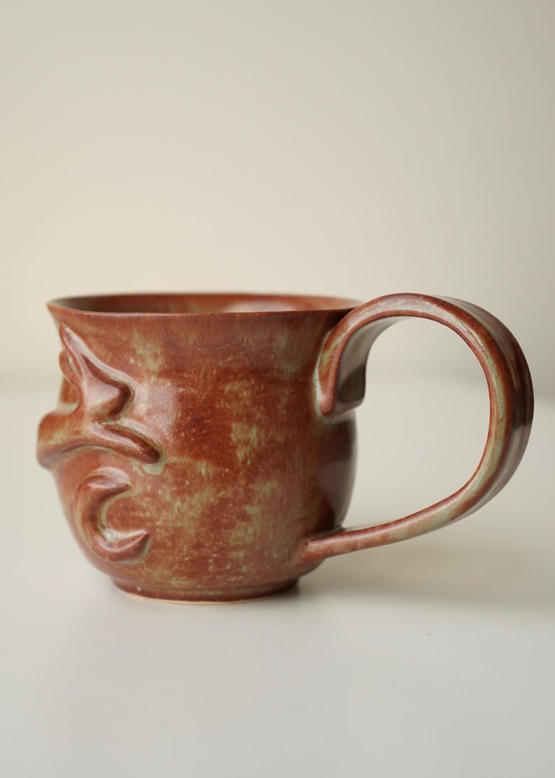 handmade ceramic bunny jumping over the moon woody space mug image 8