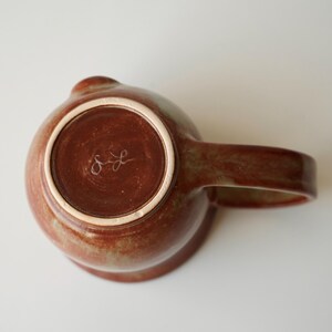 handmade ceramic bunny jumping over the moon woody space mug image 6