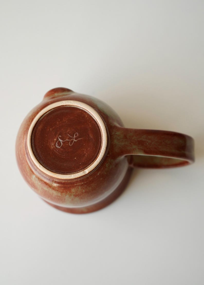 handmade ceramic bunny jumping over the moon woody space mug image 6