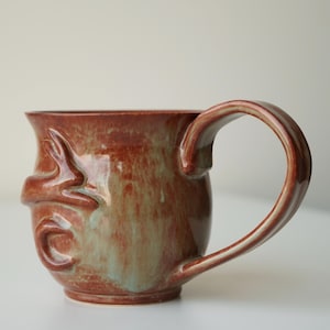 handmade ceramic bunny jumping over the moon woody space mug image 4