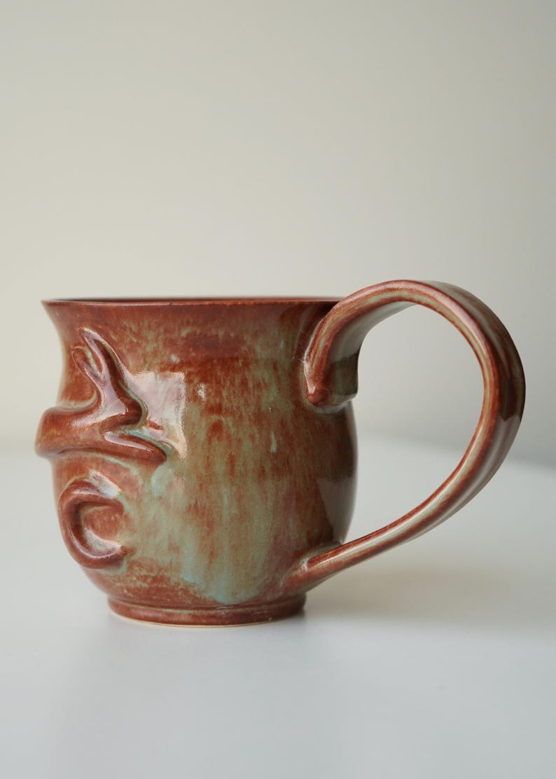 handmade ceramic bunny jumping over the moon woody space mug image 4