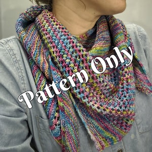 May include: A colorful knitted shawl with a lacy pattern. The shawl is worn by a person and the text "Pattern Only" is superimposed on the image.