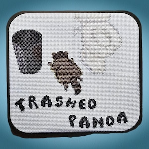 Trashed Panda – a Cross-Stitch Pattern of that Drunk and Hungover Liquor Store Raccoon (PDF)