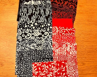 Rot-weiß-schwarze Batiks
