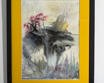 May include: Watercolor painting of a landscape with a black frame and yellow mat. The artwork depicts a mountain scene with a red-leafed tree on a rocky outcrop. The painting has a soft, ethereal quality with muted colors.