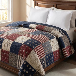 May include: A patchwork quilt with a patriotic theme, featuring squares of navy blue with white stars, red and white stripes, and tan fabric. The quilt is on a wooden bed frame with white pillows.