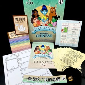 May include: A Mandarin Chinese language learning game set. The box features cartoon characters and the text "PALAVER MANDARIN CHINESE". Includes game cards, a booklet, and other learning materials. The game is for ages 3-99.