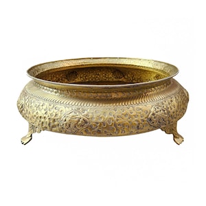 May include: A white ceramic mug with a black handle and the text "But First, Coffee" in a handwritten style. The mug is on a white surface. The mug is approximately 4 inches tall.