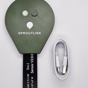 May include: An olive green Sproutlink soil moisture sensor with a black probe and a white USB cable. The sensor has the text "Sproutlink" and "Capacitive Soil Moisture Sensor V2.0.0" printed on it.
