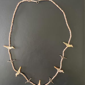 Carved  bird fetish necklace