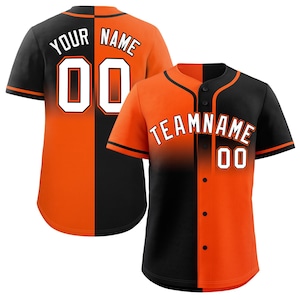 May include: Two baseball jerseys, one with "YOUR NAME" and the number "00" on the back, and the other with "TEAMNAME" and "00" on the front. The jerseys are split vertically, with orange and black panels. The sleeves are black.
