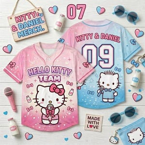 May include: Two baseball jerseys, one pink and one blue, featuring Hello Kitty graphics and the text "Kitty & Daniel." The pink jersey says "Hello Kitty Team." Accessories include sunglasses, milk bottles, and a sign that says "Kitty & Daniel Merch."