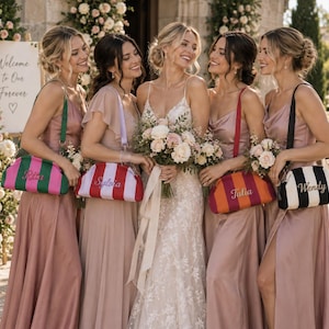 May include: Four rectangular clutch bags with metal frames and shoulder straps, each featuring vertical stripes in green and pink, red and white, orange and red, or black and white, with embroidered names Rita, Sylvia, Talia, and Wendy.